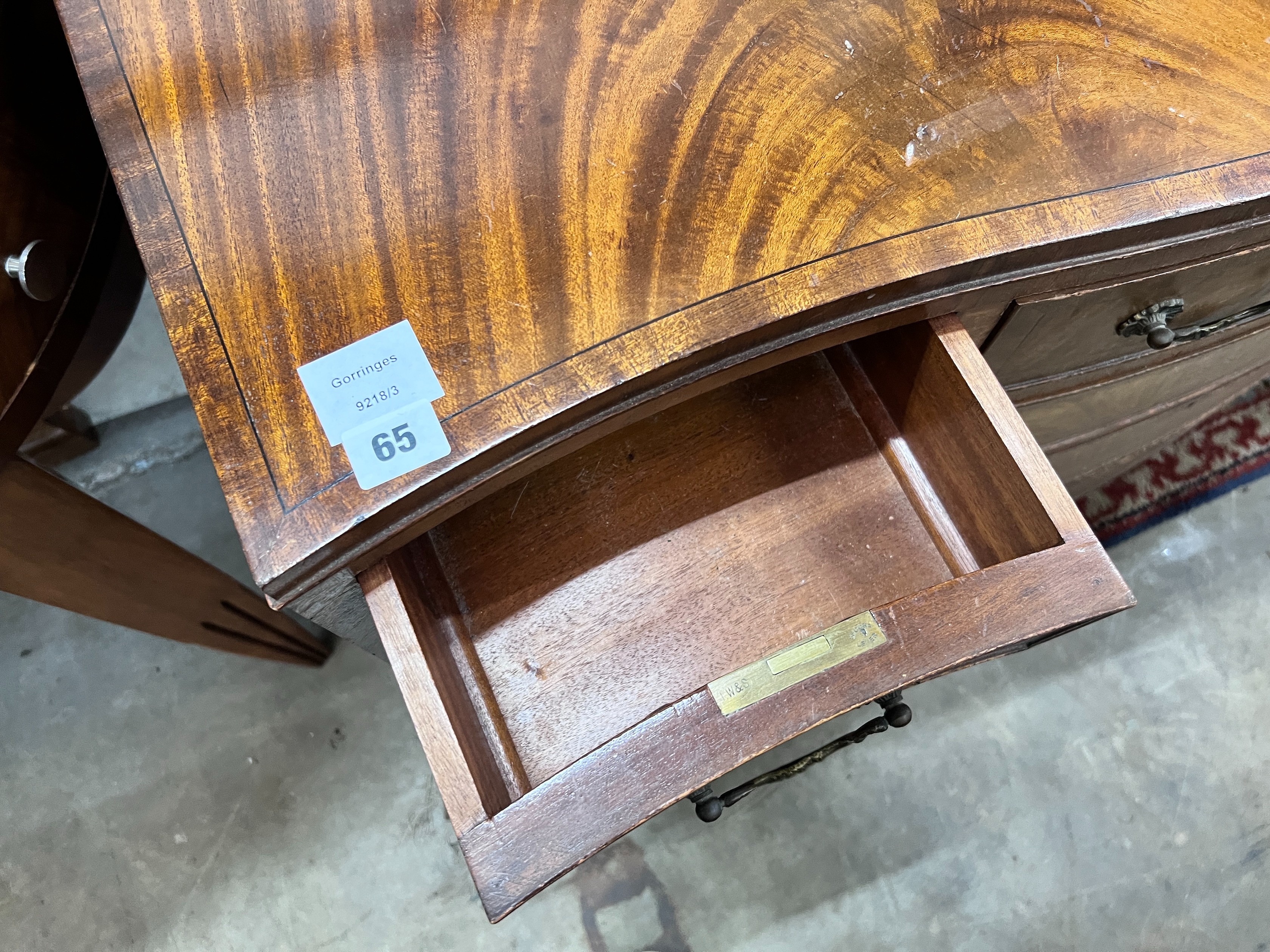 A reproduction George III style mahogany serpentine chest, width 107cm, depth 54cm, height 80cm *Please note the sale commences at 9am.